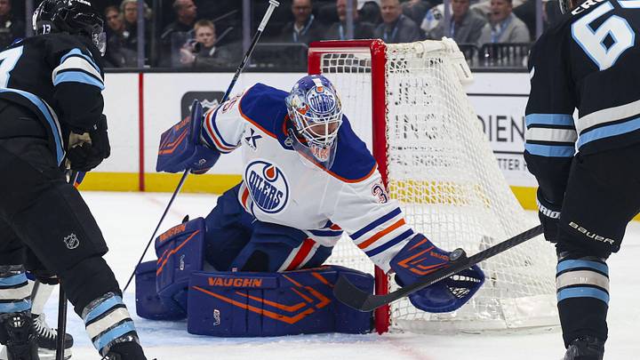 Apr 7, 2026; Salt Lake City, Utah, USA; Edmonton Oilers goaltender Tristan Jarry (35) makes a glove save against the Utah Mammoth during the first period at Delta Center. Mandatory Credit: Rob Gray-Imagn Images