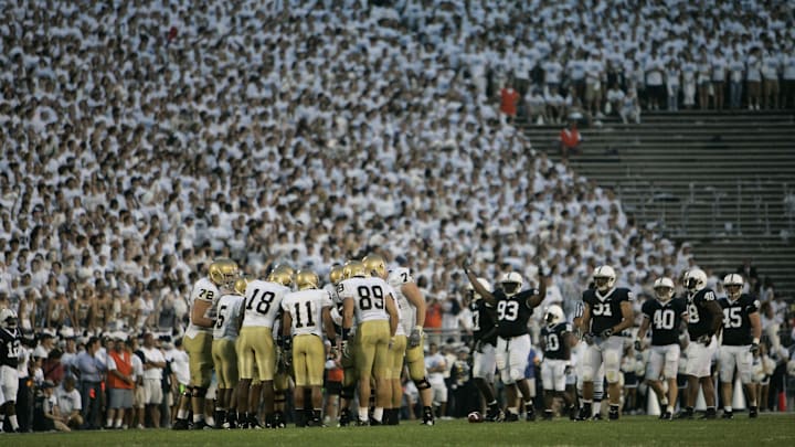 The Notre Dame Fighting Irish football team huddles before a play against the Penn State Nittany Lions in the second quarter at Beaver Stadium in 2007. 