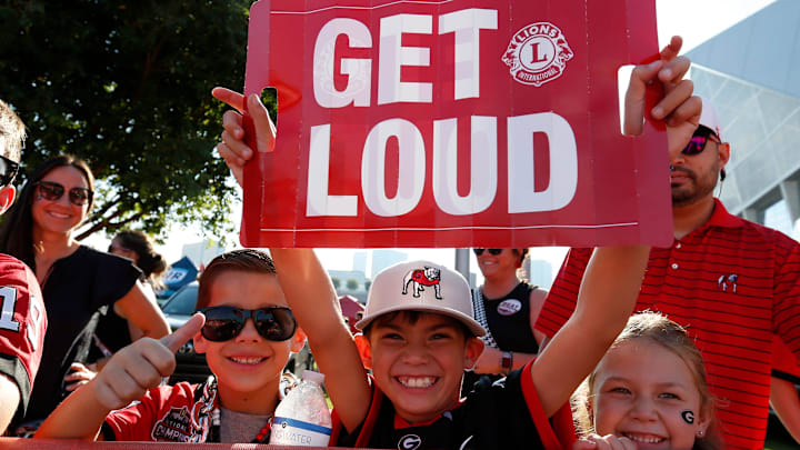 Some young Georgia fans root on their team as Georgia arrives before the start of the NCAA Aflac Kickoff Game in Atlanta, on Aug. 31, 2024. Some young Georgia fans root on their team as Georgia arrives before the start of the NCAA Aflac Kickoff Game in Atlanta, on Aug. 31, 2024.