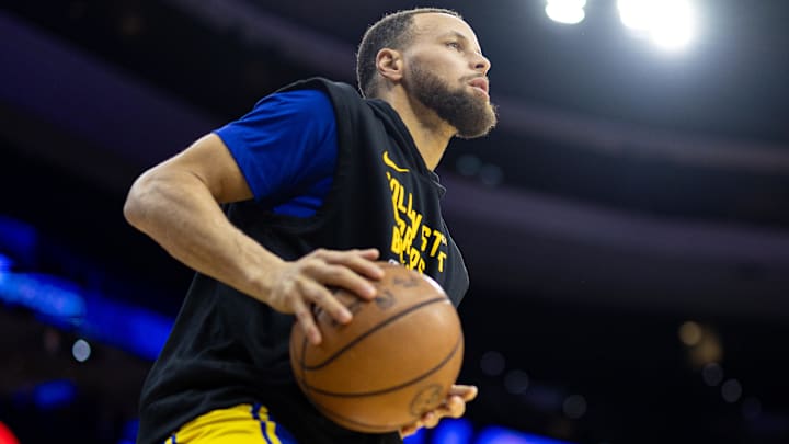 Feb 7, 2024; Philadelphia, Pennsylvania, USA; Golden State Warriors guard Stephen Curry warms up before action Philadelphia 76ers at Wells Fargo Center. Mandatory Credit: Bill Streicher-Imagn Images