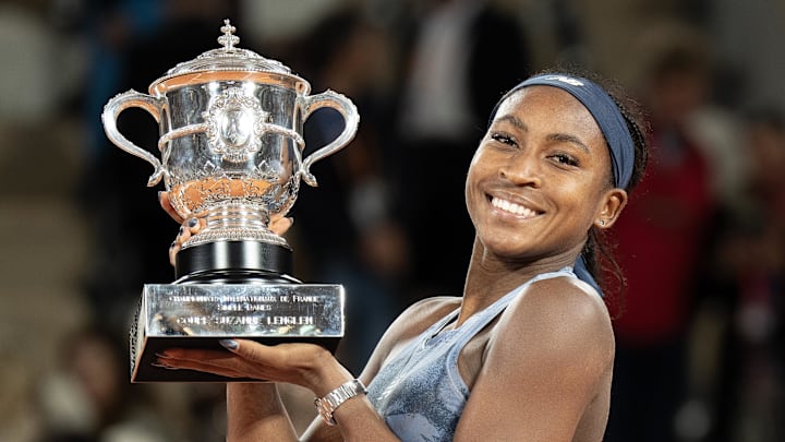 Jun 7, 2025; Paris, FR; Coco Gauff of the United States poses with the trophy after winning the women’s singles final against Aryna Sabalenka on day 14 at Roland Garros Stadium. Mandatory Credit: Susan Mullane-Imagn Images