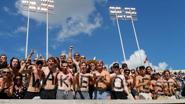 Sep 18, 2021; Winston-Salem, North Carolina, USA; Wake Forest Demon Deacons fans cheer during the second half against the Florida State Seminoles at Truist Field. Mandatory Credit: Reinhold Matay-USA TODAY Sports Sep 18, 2021; Winston-Salem, North Carolina, USA; Wake Forest Demon Deacons fans cheer during the second half against the Florida State Seminoles at Truist Field. Mandatory Credit: Reinhold Matay-USA TODAY Sports