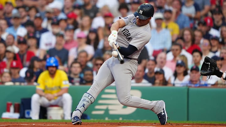Jul 27, 2024; Boston, Massachusetts, USA; New York Yankees left fielder Juan Soto (22) hits a two-run home run against the Boston Red Sox during the first inning at Fenway Park. Mandatory Credit: Gregory Fisher-Imagn Images