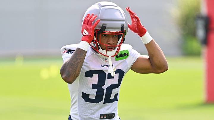 Jul 28, 2026; Foxborough, MA, USA; New England Patriots running back Treveyon Henderson (32) walks to practice for training camp at Gillette Stadium. Jul 28, 2026; Foxborough, MA, USA; New England Patriots running back Treveyon Henderson (32) walks to practice for training camp at Gillette Stadium.