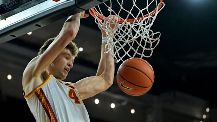 Dec 21, 2025; Los Angeles, California, USA; USC Trojans center Gabe Dynes (45) dunks the ball in the first half against the UC Santa Cruz Banana Slugs at Galen Center. Mandatory Credit: Jayne Kamin-Oncea-Imagn Images