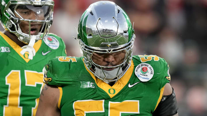 Jan 1, 2025; Pasadena, CA, USA; Oregon Ducks defensive lineman Derrick Harmon (55) reacts in the second half against the Ohio State Buckeyes in the 2025 Rose Bowl college football quarterfinal game at Rose Bowl Stadium. Mandatory Credit: Kirby Lee-Imagn Images