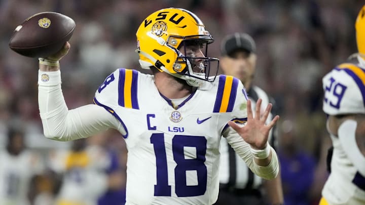 Nov 8, 2025; Tuscaloosa, Alabama, USA;  LSU quarterback Garrett Nussmeier (18) throws a pass during the second half of the game with Alabama at Saban Field at Bryant-Denny Stadium. Alabama defeated LSU 20-9. Mandatory Credit: Gary Cosby Jr.-Imagn Images
