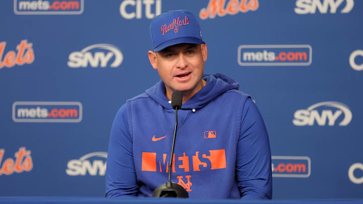 Mar 26, 2026; New York City, New York, USA; New York Mets manager Carlos Mendoza (64) speaks at a press conference before his team's opening day game against the Pittsburgh Pirates at Citi Field. Mandatory Credit: Brad Penner-Imagn Images