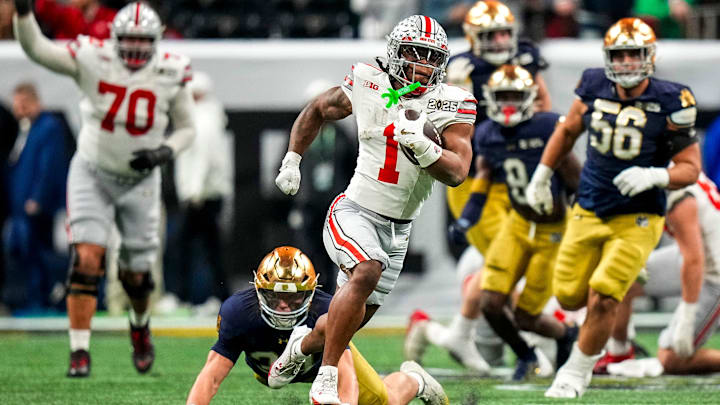 Ohio State Buckeyes running back Quinshon Judkins (1) runs the ball against the Notre Dame Fighting Irish during the College Football Playoff championship at Mercedes-Benz Stadium in Atlanta on Jan. 20, 2025. Ohio State Buckeyes tight end Gee Scott Jr. (88) Ohio State Buckeyes running back Quinshon Judkins (1) runs the ball against the Notre Dame Fighting Irish during the College Football Playoff championship at Mercedes-Benz Stadium in Atlanta on Jan. 20, 2025. Ohio State Buckeyes tight end Gee Scott Jr. (88)