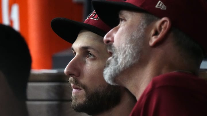 Arizona Diamondbacks starting pitcher Zac Gallen (23) speaks with manager Torey Lovullo (right) in the dugout during the sixth inning against the Texas Rangers in game one of the 2023 World Series at Globe Life Field in Arlington, Texas, on Oct. 27, 2023. Arizona Diamondbacks starting pitcher Zac Gallen (23) speaks with manager Torey Lovullo (right) in the dugout during the sixth inning against the Texas Rangers in game one of the 2023 World Series at Globe Life Field in Arlington, Texas, on Oct. 27, 2023.
