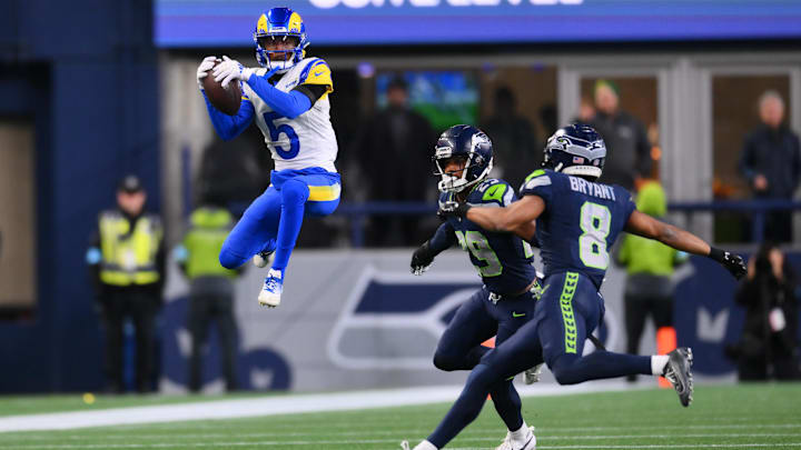 Nov 3, 2024; Seattle, Washington, USA; Los Angeles Rams wide receiver Tutu Atwell (5) catches a pass against the Seattle Seahawks during overtime at Lumen Field. Mandatory Credit: Steven Bisig-Imagn Images