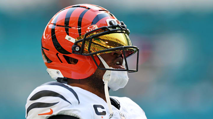 Dec 21, 2025; Miami Gardens, Florida, USA; Cincinnati Bengals wide receiver Ja'Marr Chase (1) warms up before the game against the Miami Dolphins at Hard Rock Stadium. Mandatory Credit: Nathan Ray Seebeck-Imagn Images