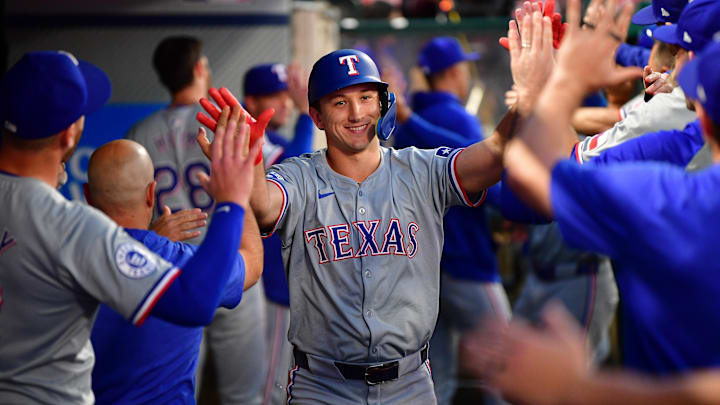 Sep 27, 2024; Anaheim, California, USA; Texas Rangers center fielder Wyatt Langford (36) celebrates after hitting a two run home run against the Los Angeles Angels during the first inning at Angel Stadium. 