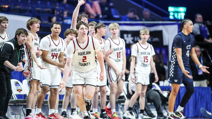 Harlan County's Trent Noah (2) signals three after his 3-point goal as Warren Central's Kade Unseld