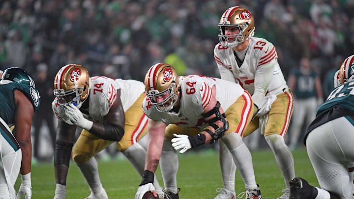 Dec 3, 2023; Philadelphia, Pennsylvania, USA; San Francisco 49ers center Jake Brendel (64) snaps the