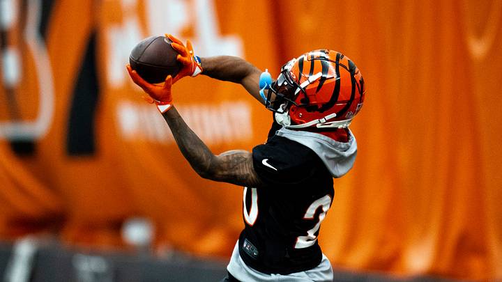 Cincinnati Bengals cornerback DJ Turner II (20) catches a pass during an interception drill at Bengals spring practice at the IEL Indoor Facility in Cincinnati on Tuesday, June 11, 2024. Cincinnati Bengals cornerback DJ Turner II (20) catches a pass during an interception drill at Bengals spring practice at the IEL Indoor Facility in Cincinnati on Tuesday, June 11, 2024.