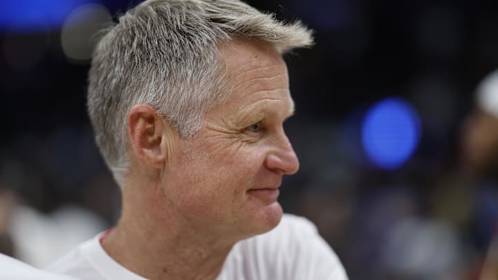 Nov 4, 2024; Washington, District of Columbia, USA; Golden State Warriors head coach Steve Kerr smiles on the court after the game against the Washington Wizards at Capital One Arena. Mandatory Credit: Geoff Burke-Imagn Images