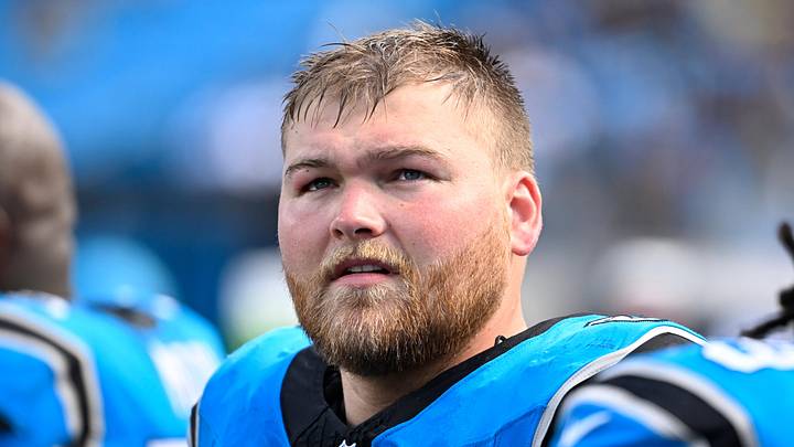 Sep 21, 2025; Charlotte, North Carolina, USA;  Carolina Panthers center Cade Mays (64) on the sidelines in the fourth quarter at Bank of America Stadium. Mandatory Credit: Bob Donnan-Imagn Images