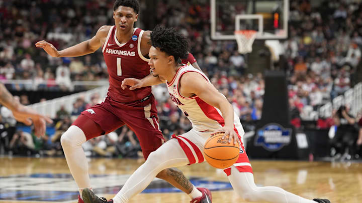 Mar 26, 2026; San Jose, CA, USA; Arizona Wildcats guard Brayden Burries (5) dribbles the ball against Arkansas Razorbacks guard Meleek Thomas (1) in the second half during a Sweet Sixteen game of the West Regional of the men's 2026 NCAA Tournament at SAP Center. Mandatory Credit: Kyle Terada-Imagn Images Mar 26, 2026; San Jose, CA, USA; Arizona Wildcats guard Brayden Burries (5) dribbles the ball against Arkansas Razorbacks guard Meleek Thomas (1) in the second half during a Sweet Sixteen game of the West Regional of the men's 2026 NCAA Tournament at SAP Center. Mandatory Credit: Kyle Terada-Imagn Images