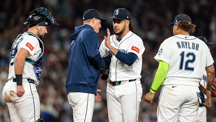 Apr 11, 2026; Seattle, Washington, USA; Seattle Mariners manager Dan Wilson, second from left, pulls starting pitcher Luis Castillo (58) from the game during a meeting at mound with catcher Cal Raleigh (29) and first baseman Josh Naylor (12)in the fourth inning against the Houston Astros at T-Mobile Park. Mandatory Credit: Stephen Brashear-Imagn Images Apr 11, 2026; Seattle, Washington, USA; Seattle Mariners manager Dan Wilson, second from left, pulls starting pitcher Luis Castillo (58) from the game during a meeting at mound with catcher Cal Raleigh (29) and first baseman Josh Naylor (12)in the fourth inning against the Houston Astros at T-Mobile Park. Mandatory Credit: Stephen Brashear-Imagn Images