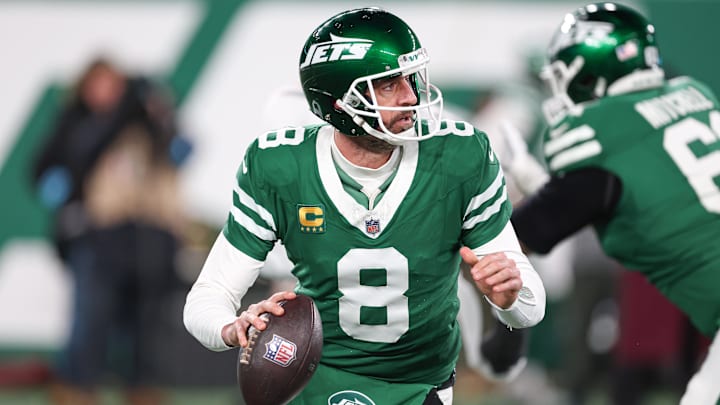 Jan 5, 2025; East Rutherford, New Jersey, USA; New York Jets quarterback Aaron Rodgers (8) rolls out during the first half against the Miami Dolphins at MetLife Stadium. Mandatory Credit: Vincent Carchietta-Imagn Images Jan 5, 2025; East Rutherford, New Jersey, USA; New York Jets quarterback Aaron Rodgers (8) rolls out during the first half against the Miami Dolphins at MetLife Stadium. Mandatory Credit: Vincent Carchietta-Imagn Images