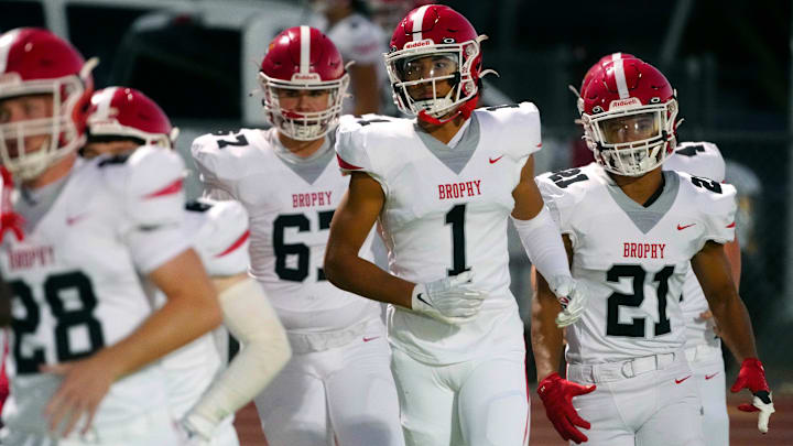 Brophy Prep wide receiver Devin Fitzgerald (1) takes the field with his team during a game at Centennial High School on Sept. 13, 2024.