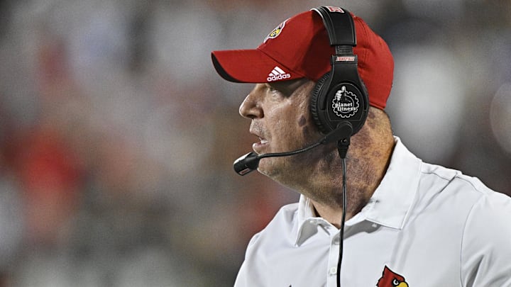 Sep 5, 2025; Louisville, Kentucky, USA; Louisville Cardinals head coach Jeff Brohm watches from the sideline during the second half against the James Madison Dukes at L&N Federal Credit Union Stadium. Mandatory Credit: Jamie Rhodes-Imagn Images Sep 5, 2025; Louisville, Kentucky, USA; Louisville Cardinals head coach Jeff Brohm watches from the sideline during the second half against the James Madison Dukes at L&N Federal Credit Union Stadium. Mandatory Credit: Jamie Rhodes-Imagn Images