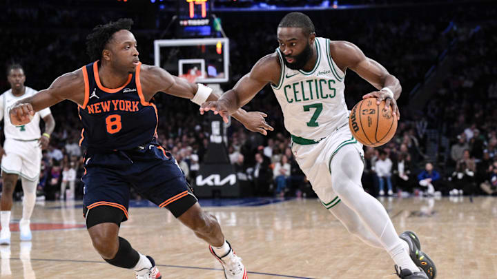Apr 8, 2025; New York, New York, USA; Boston Celtics guard Jaylen Brown (7) drives past New York Knicks forward OG Anunoby (8) during the second half at Madison Square Garden. Mandatory Credit: John Jones-Imagn Images