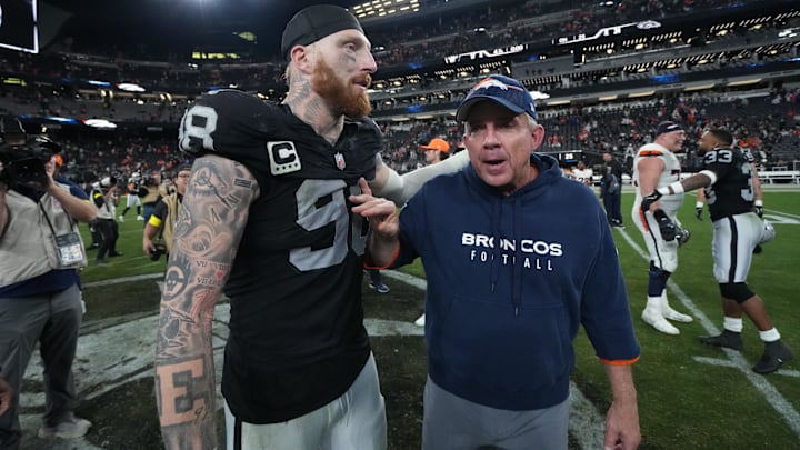 Dec 7, 2025; Paradise, Nevada, USA;  Las Vegas Raiders defensive end Maxx Crosby (98) and Denver Broncos head coach Sean Payton meet on the field following a game at Allegiant Stadium.