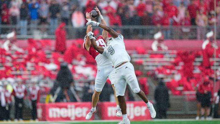 Sep 19, 2026; Madison, Wisconsin, USA;  Wisconsin Badgers safety Matt Jung (29) intercepts the pass intended for Eastern Michigan Eagles tight end Joshua Long (9) during the second quarter at Camp Randall Stadium. Mandatory Credit: Jeff Hanisch-Imagn Images