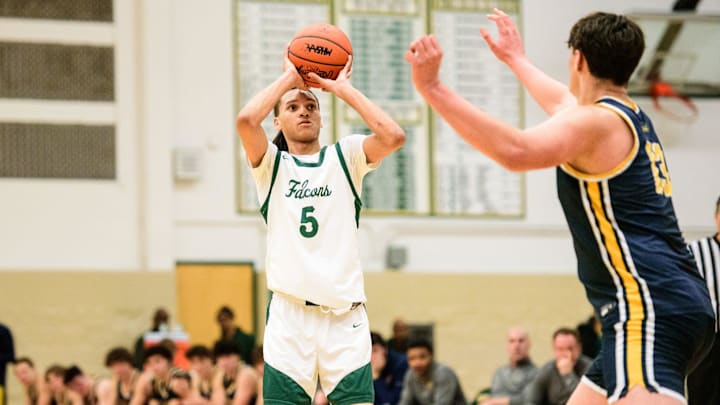 Birmingham Groves' John Simpson shoots during an Oakland Activities Association-Red boys basketball game on Thursday, Jan. 16, 2024.
