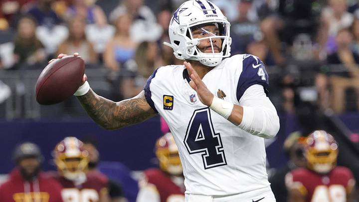 Dallas Cowboys quarterback Dak Prescott drops back to pass against the Washington Commanders. Dallas Cowboys quarterback Dak Prescott drops back to pass against the Washington Commanders.