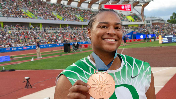Oregon’s Jaida Ross shows off her bronze medal in the women’s shot put on day 9 of the U.S. Olympic Track and Field Trials at Hayward Field in Eugene on Saturday, June 29, 2024.