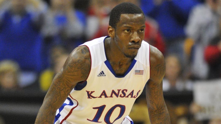 March 09, 2012; Kansas City, MO, USA; Kansas Jayhawks guard Tyshawn Taylor (10) plays defense during the second half of the game against the Baylor Bears in the semifinal round of the 2012 Big 12 Tournament at the Sprint Center. Baylor won Mandatory Credit: Denny Medley-Imagn Images March 09, 2012; Kansas City, MO, USA; Kansas Jayhawks guard Tyshawn Taylor (10) plays defense during the second half of the game against the Baylor Bears in the semifinal round of the 2012 Big 12 Tournament at the Sprint Center. Baylor won Mandatory Credit: Denny Medley-Imagn Images