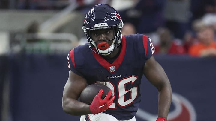 Jan 13, 2024; Houston, Texas, USA; Houston Texans running back Devin Singletary (26) in a 2024 AFC wild card game against the Cleveland Browns at NRG Stadium. Mandatory Credit: Troy Taormina-USA TODAY Sports