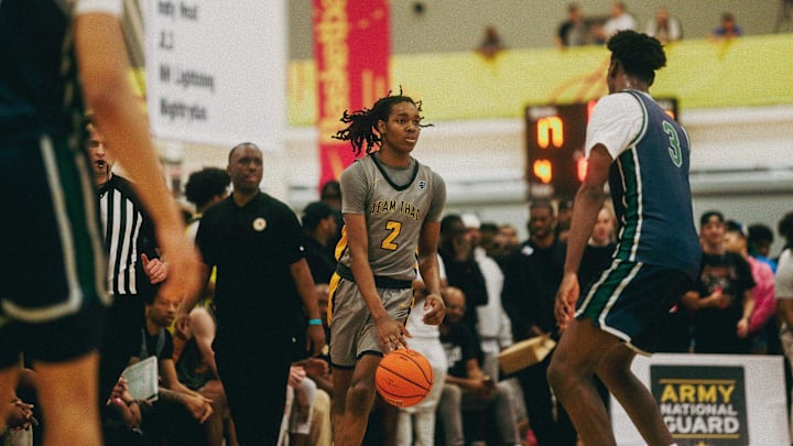 Team Thad’s Jasper Johnson (2) brings the ball up the court against Team Oak Soldiers’ AJ D Dybansta