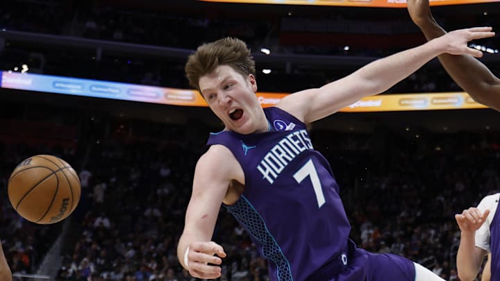 Dec 20, 2025; Detroit, Michigan, USA;  Charlotte Hornets guard Kon Knueppel (7) reacts after being fouled in the second half against the Detroit Pistons t Little Caesars Arena. Mandatory Credit: Rick Osentoski-Imagn Images