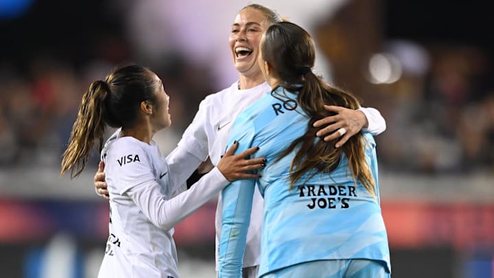 Bay FC defender Abby Dahlkemper (13) celebrates with goalkeeper Katelyn Rowland (0) and defender Caprice Dydasco (3) after the game against North Carolina Courage at PayPal Park 