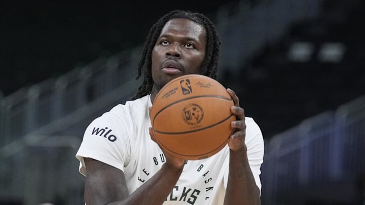 Chris Livingston puts up a shot during pregame warmups before a game against the New York Knicks at Fiserv Forum on March 28.
