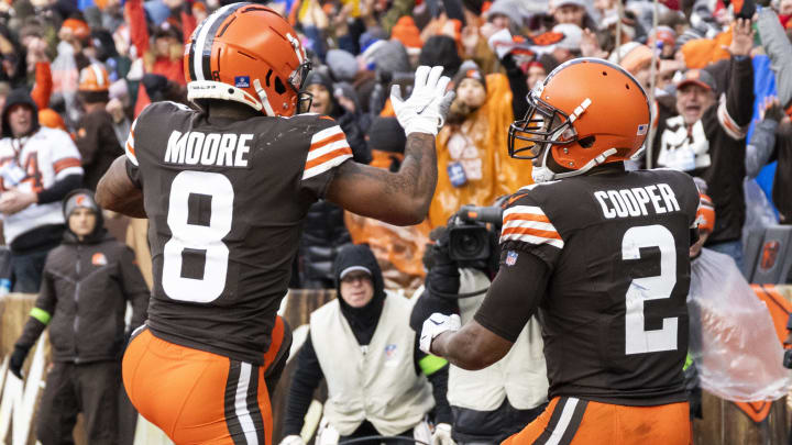 Dec 17, 2023; Cleveland, Ohio, USA; Cleveland Browns wide receiver Amari Cooper (2) celebrates his touchdown run with wide receiver Elijah Moore (8) during the fourth quarter against the Chicago Bears at Cleveland Browns Stadium. Mandatory Credit: Scott Galvin-USA TODAY Sports