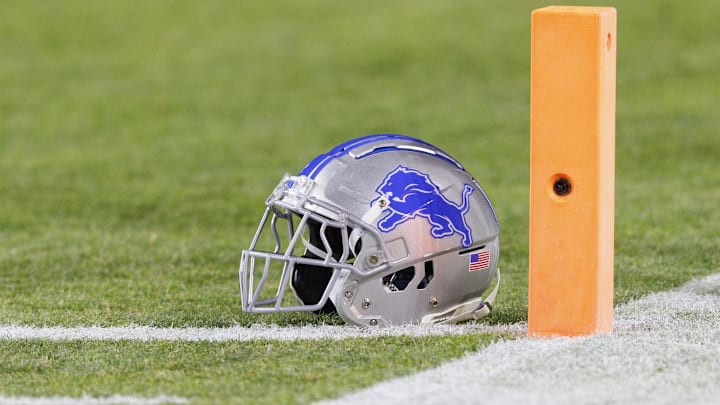 Jan 8, 2023; Green Bay, Wisconsin, USA;  A Detroit Lions helmet sits on the field during warmups prior to the game against the Green Bay Packers at Lambeau Field. Mandatory Credit: Jeff Hanisch-Imagn Images