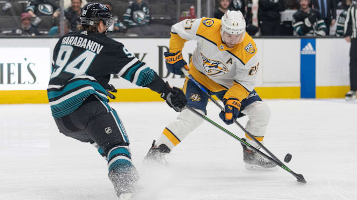 Feb 24, 2024; San Jose, California, USA; Nashville Predators defenseman Ryan McDonagh (27) battles