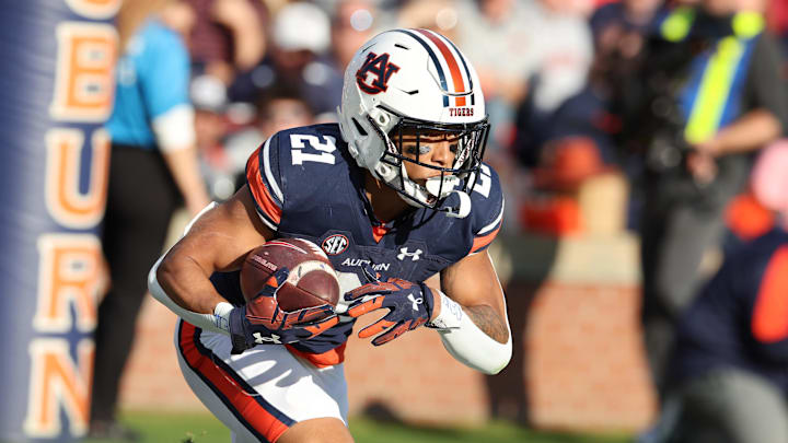Nov 25, 2023; Auburn, Alabama, USA;  Auburn Tigers running back Brian Battie (21) returns a kick