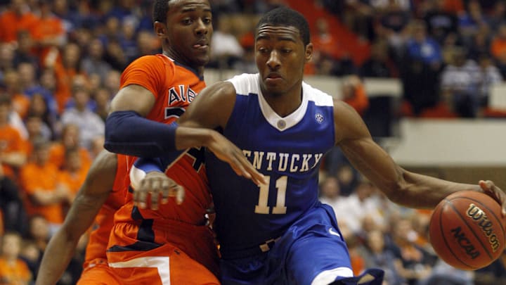 Jan 16, 2010; Auburn, AL, USA; Kentucky Wildcats guard John Wall (11) is blocked by Auburn Tigers guard Tay Waller (24) during the second half at Beard Eaves Memorial Coliseum in Auburn. The Wildcats beat the Tigers 72-67. Mandatory Credit: John Reed-Imagn Images Jan 16, 2010; Auburn, AL, USA; Kentucky Wildcats guard John Wall (11) is blocked by Auburn Tigers guard Tay Waller (24) during the second half at Beard Eaves Memorial Coliseum in Auburn. The Wildcats beat the Tigers 72-67. Mandatory Credit: John Reed-Imagn Images