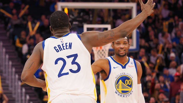 Jan 24, 2024; San Francisco, California, USA; Golden State Warriors forward Draymond Green (23) celebrates with forward Jonathan Kuminga (00) after a play against the Atlanta Hawks during the fourth quarter at Chase Center. Mandatory Credit: Kelley L Cox-Imagn Images Jan 24, 2024; San Francisco, California, USA; Golden State Warriors forward Draymond Green (23) celebrates with forward Jonathan Kuminga (00) after a play against the Atlanta Hawks during the fourth quarter at Chase Center. Mandatory Credit: Kelley L Cox-Imagn Images