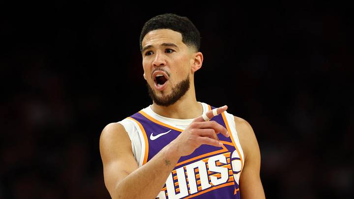 Mar 24, 2026; Phoenix, Arizona, USA; Phoenix Suns guard Devin Booker (1) reacts against the Denver Nuggets in the first half at Mortgage Matchup Center. Mandatory Credit: Mark J. Rebilas-Imagn Images Mar 24, 2026; Phoenix, Arizona, USA; Phoenix Suns guard Devin Booker (1) reacts against the Denver Nuggets in the first half at Mortgage Matchup Center. Mandatory Credit: Mark J. Rebilas-Imagn Images