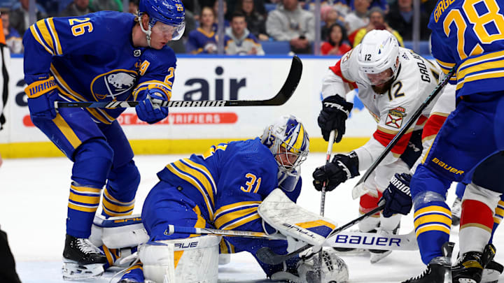 Feb 15, 2024; Buffalo, New York, USA;  Buffalo Sabres goaltender Eric Comrie (31) looks to cover up