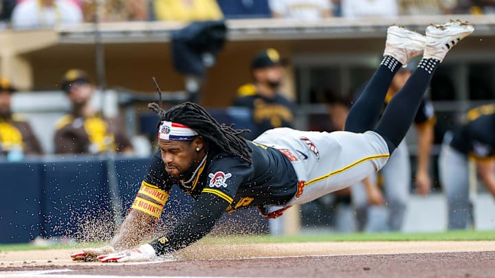 May 31, 2025; San Diego, California, USA; Pittsburgh Pirates center fielder Oneil Cruz (15) scores a run during the first inning against the San Diego Padres at Petco Park. Mandatory Credit: David Frerker-Imagn Images