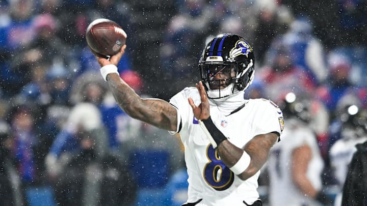 Baltimore Ravens quarterback Lamar Jackson (8) throws the ball during warm ups before the game against the Buffalo Bills in a 2025 AFC divisional round game at Highmark Stadium.