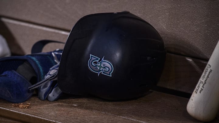 Jun 5, 2022; Arlington, Texas, USA; A view of a Seattle Mariners batting helmet and logo during the game between the Texas Rangers and the Seattle Mariners at Globe Life Field. Mandatory Credit: Jerome Miron-Imagn Images